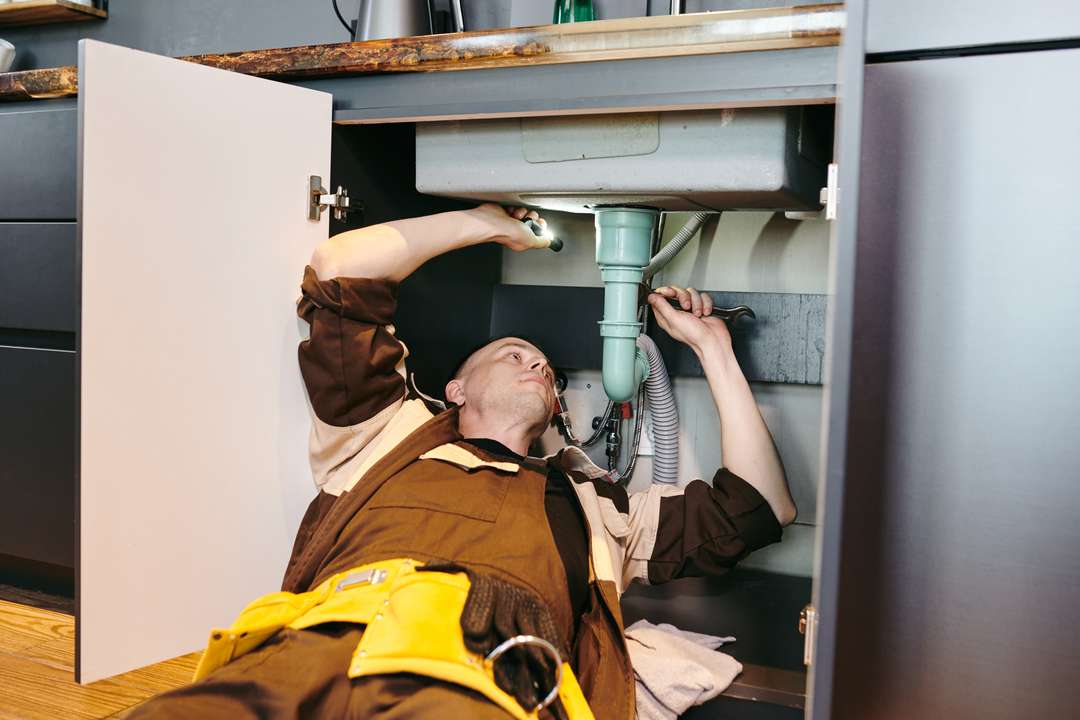Plumbing business owner working with Grow My Digital